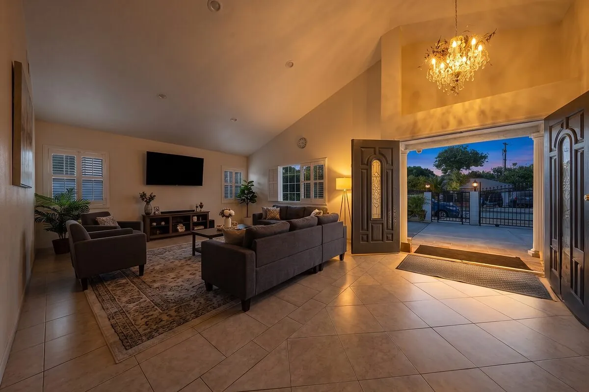 Before - closed-off dated living area with the original dividing wall and finishes